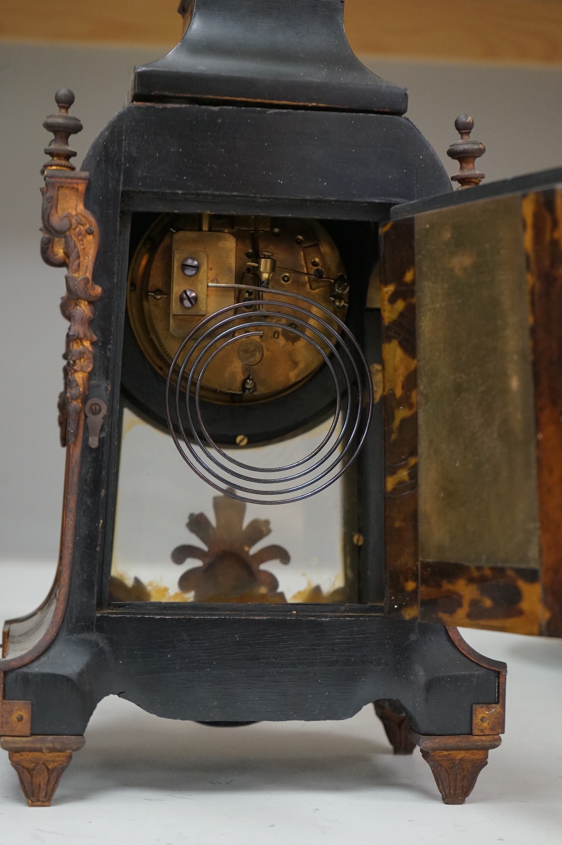 Two mantel clocks with French movements, circa 1900 to include an Art Nouveau inlaid example, largest 39cm high